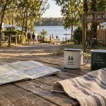 camping lac de l uby : table et vue du lac, tentes et baignade
