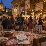 Fêtes dans le Gers ce week end : table et stands sous la halle