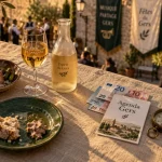 Fete gers : table gourmande et bandas sur une place du Gers